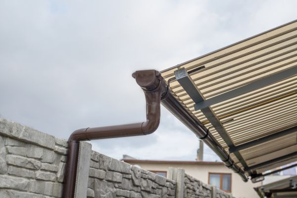 Plastic Downspout Installation in Troy